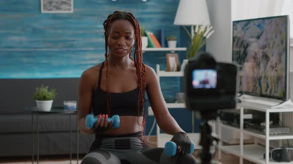 Slim Black Trainer Doing Morning Yoga Exercices Sitting on Fitness Swiss Ball / Videohive