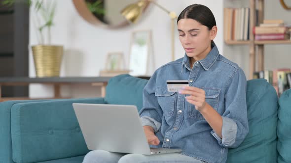 Online Shopping Loss on Laptop By Latin Woman 