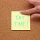 Note on a cork board reading 'Tax Time' - VideoHive Item for Sale