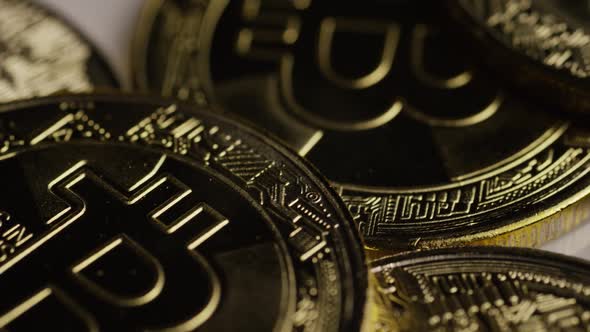 Rotating shot of Bitcoins (digital cryptocurrency) - BITCOIN 0399