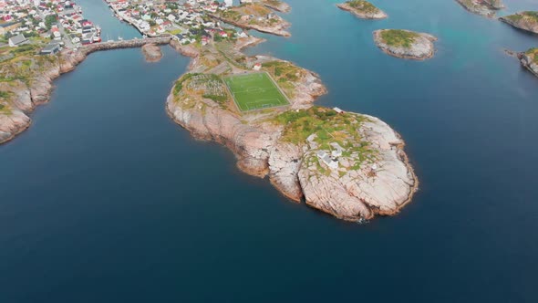 Lofoten Islands in blue ocean from above