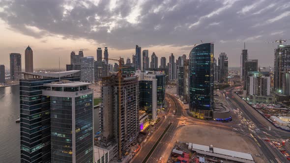 Dubai Business Bay Towers Day to Night Timelapse Aerial