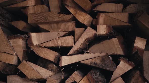 Stacked Oak Firewood in the Woodshed