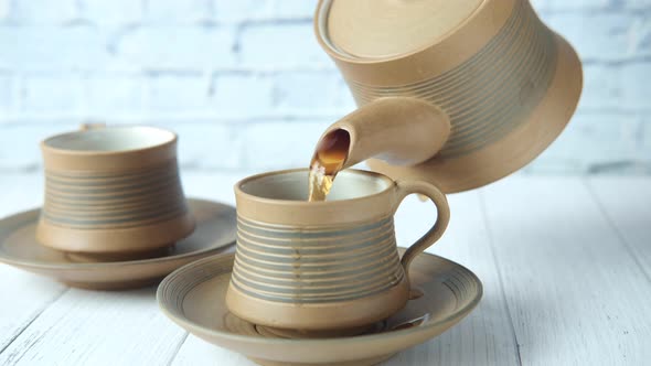 Pouring Tea From a Tea Ceremony Top Down