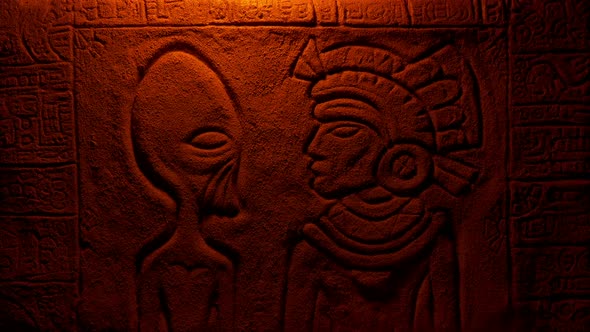 Fire Lights Alien And Aztec Man In Wall Carving alt