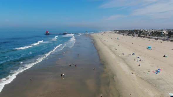 Aerial View of Huntington Pier, Beach and Coastline During Sunny Summer Day