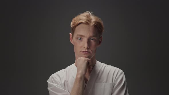 Portrait Of Young Guy In Medical Gown