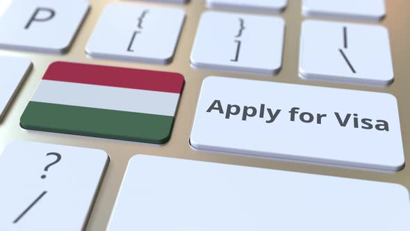 APPLY FOR VISA Text and Flag of Hungary on the Keys alt