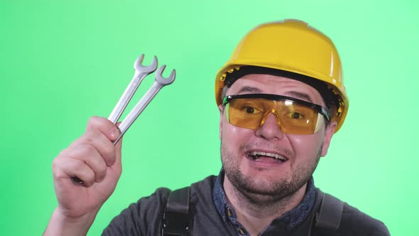 Engineer on a Background of Chromakey Portrait of a Car Mechanic on a Green Background