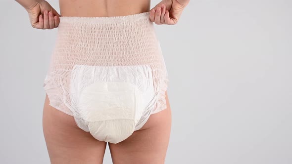 Rear View of a Woman in Adult Diapers