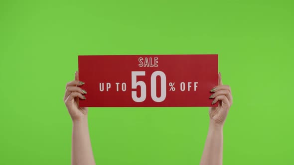 Sale Up To 50 Percent Off Advertisement Inscription on Paper Sheet in Womans Hands on Chroma Key