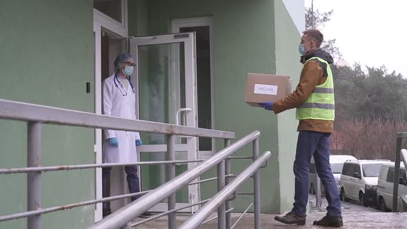 Vaccine delivery. The doctor receives the long-awaited vaccine.