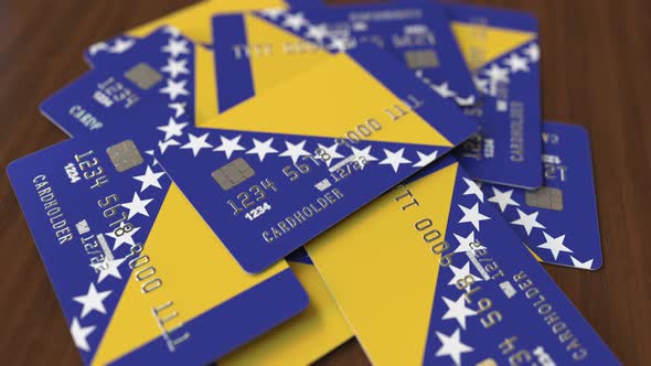 Pile of Credit Cards with Flag of Bosnia and Herzegovina alt