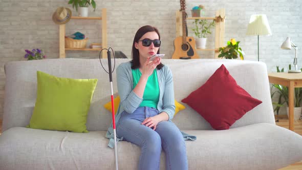 Young Visually Impaired Woman Talking on the Phone