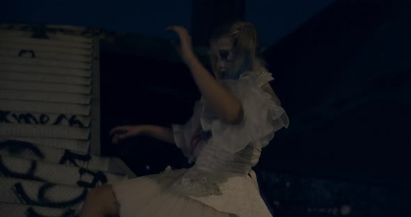 Dancing Woman in Harley Quinn Costume Shot at Night