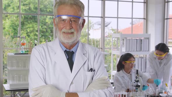 Scientist Work with Science Equipment in Laboratory