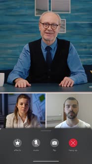 Vertical Video Team of Businesspeople Attending Online Videoconference