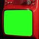 A Retro Red Television with Green Screen Against Black Background. - VideoHive Item for Sale