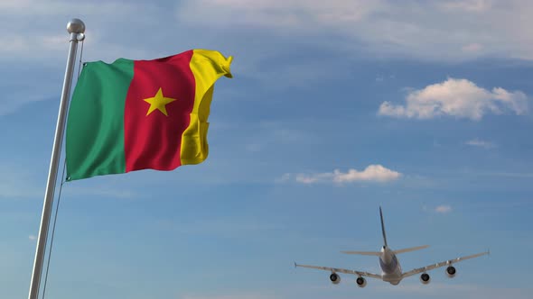 Airplane Flying Over Flag of Cameroon alt