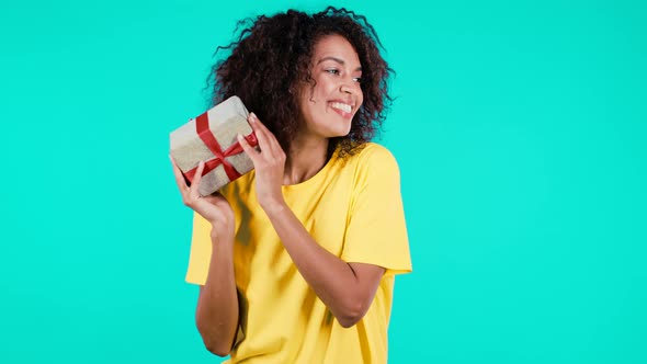 Beautiful African Woman Received Gift Box with Bow