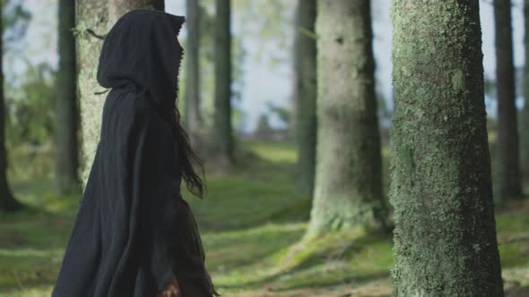 Woman walking in the forest