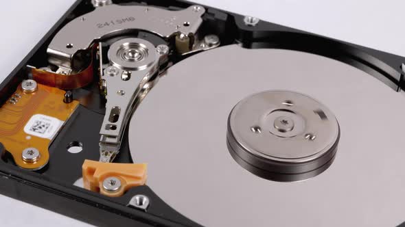 Hard Disk Drive Inside. Structure of HDD, Spinning Platter. Move Magnetic Head