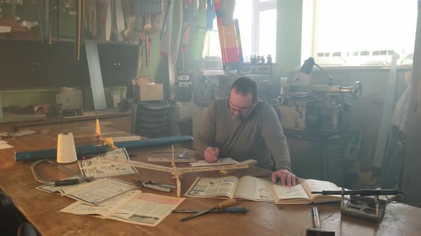 The Master Makes Calculations in the Aircraft Modeling Club