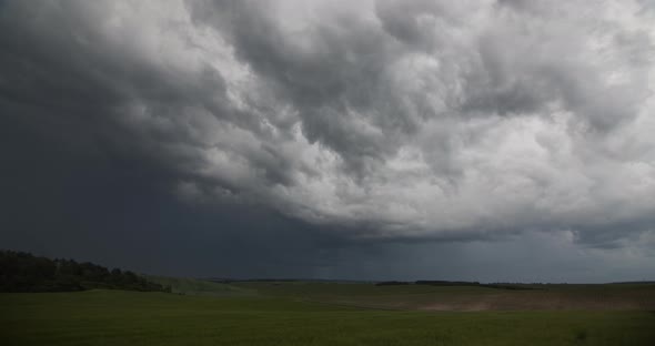 Storm Clouds In The Field  alt