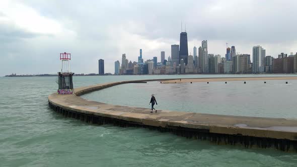 person walking in north chicago lake michigan, fitness and sports, visit travel explore illinois