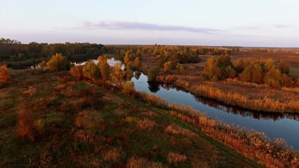 Aerial View Abowe Autumn Forest With River At Sunset 1
