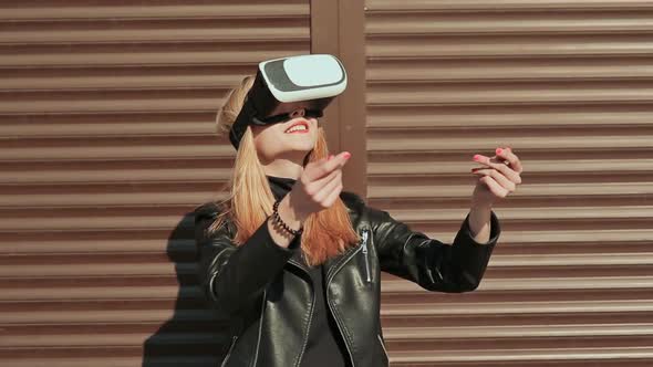 A Stylish Girl in Virtual Glasses Near Horizontal Brown Curtains