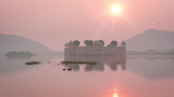 Romantic Jal Mahal Water Palace and Serene Rose Skies at Sunrise in Jaipur. Rajasthan, India