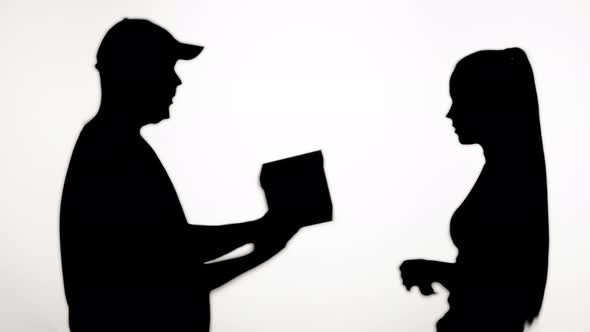 Shadow of Delivery Man Giving Present to Woman on White Background