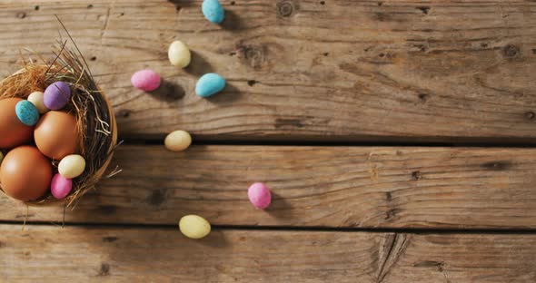 Video of decorated colorful easter eggs on a wooden surface