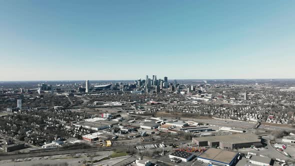 wide aerial drone shot of the downtown Minneapolis skyline in Minnesota