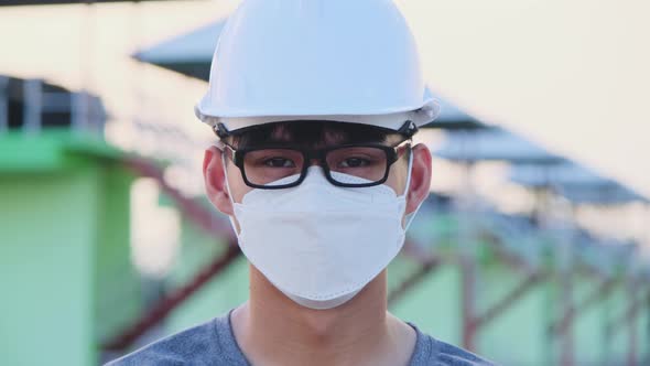 A young engineer works in a dam during the coronavirus outbreak.