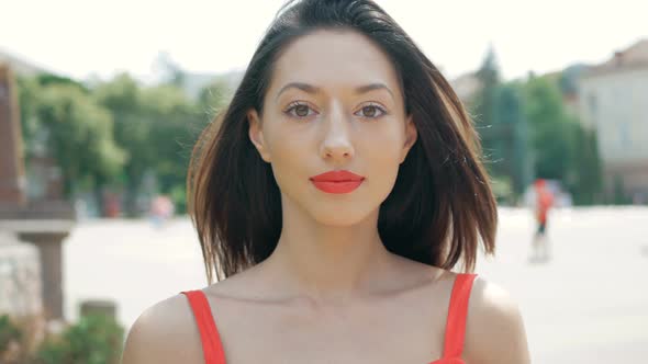 beautiful model looks into the camera. fashion portrait of a young mixed race woman with big eyes, l