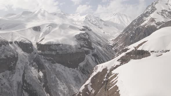 Gudauri, Georgia - April 12, 2021: Aerial view of Russia–Georgia Friendship Monument