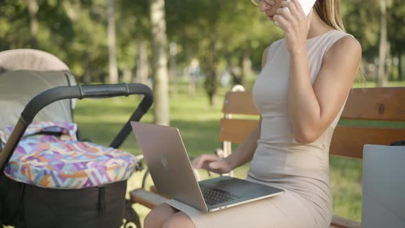 Unrecognizable Confident Slim Businesswoman Working Online, Talking on the Phone, and Taking Care of