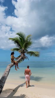 Anse Takamaka Beach Mahe Seychelles Tropical Beach with Palm Trees and a Blue Ocean Couple Man and