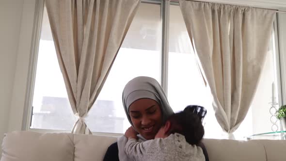 Mother and daughter at home