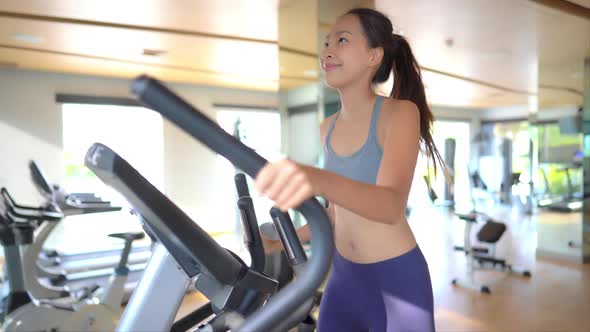 Woman run on treadmill in gym
