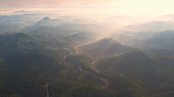 4K Drone Flying in the clouds. Flying through the clouds during sunrise