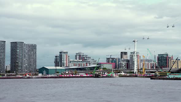 View of the Emirates Air Line Cable Car Cabins Over the River Thames