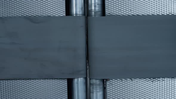 Closeup Empty Conveyor Belt Moving at Modern Automated Manufacturing Facility