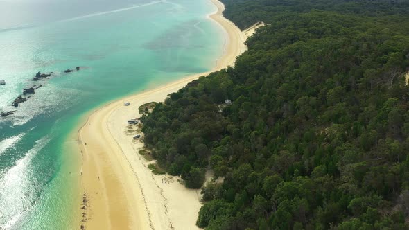 Flying along the coast of Moreton Island, Shipwrecks on the left, Queensland Australia. Drone footag