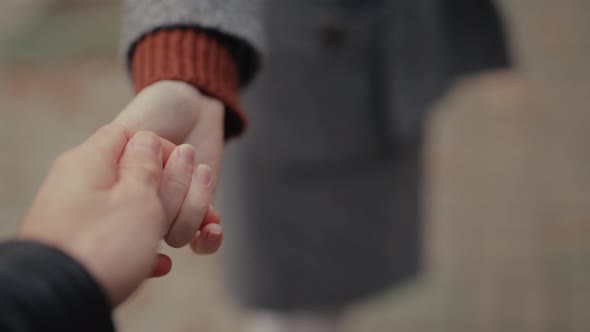 POV Couple Holding Each Other's Hands