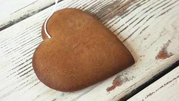 Decoration of Gingerbread Cookie with Icing Sugar