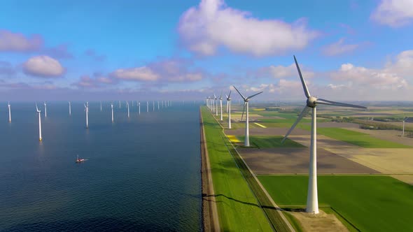 Wind Turbines in the Early Morning Wind Mill Park in the Netherlands