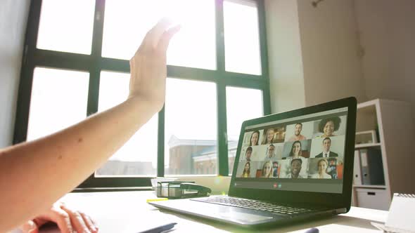 Woman with Laptop Having Video Call at Office